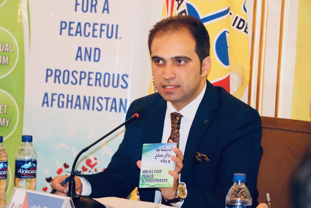 Mr. Khalid Ramizy introducing the CD "Ideas for Peace & Prosperity" to the symposium participants