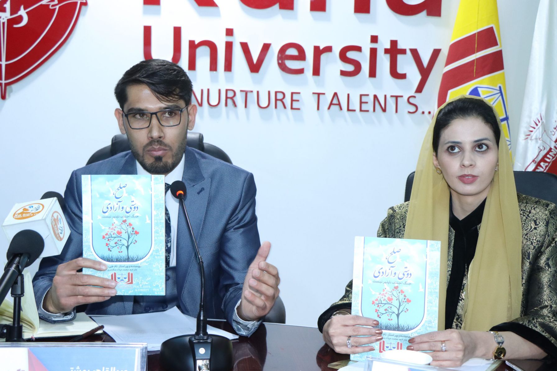 Mr. Abdul Qahir Beheshti and Ms. Manizha Ramizy while introducing the Book " Peace, Love & Liberty"