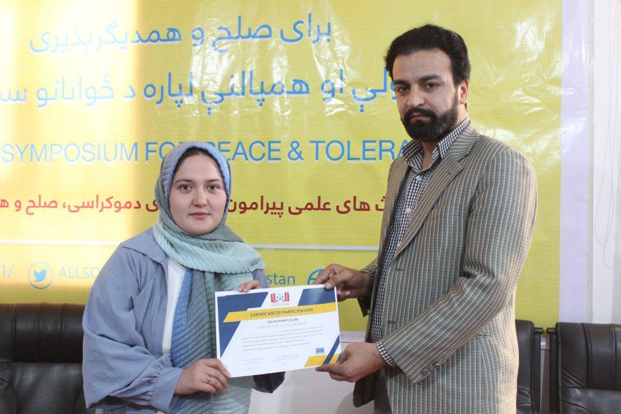 One of the participants while receiving her certificate...